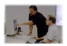 John Mark Osborne helping a student.